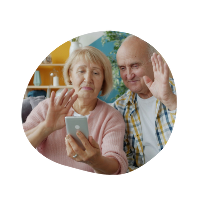Parents waving to a video call
